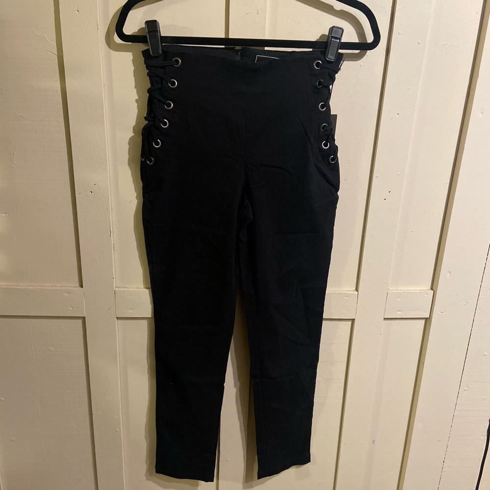 Have black lace up sides stretch pants size medium NWT